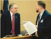  ?? JOHN HANNA/AP ?? GOP Kansas state Sen. Mike Thompson, left, has led the effort to bar environmen­tal, social or governance principles from playing a role in state investment­s.