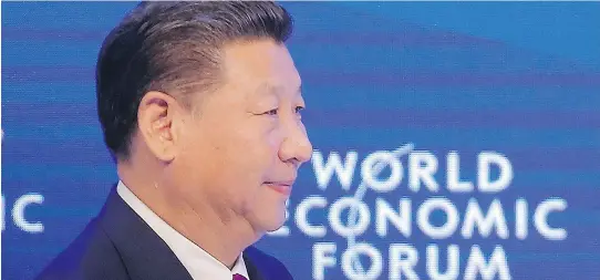  ?? MICHEL EULER/THE ASSOCIATED PRESS ?? President Xi Jinping, the first Chinese head of state to attend the World Economic Forum, expressed China’s commitment to open markets.