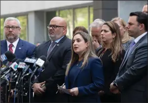  ?? The Associated Press ?? LIFE SENTENCE: United States Attorney for the Southern District of Florida Ariana Fajardo Orshan, center, speaks during a news conference following the sentencing of Mexican drug lord Joaquin “El Chapo” Guzman on Wednesday in New York.