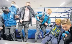  ?? ?? FALL OR NOTHING Nicola Sturgeon takes a tumble as she and Douglas Ross visit Bluevale Community Club. Pics: Wattie Cheung