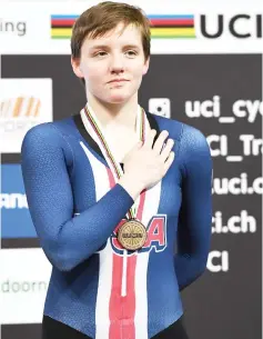  ??  ?? Bronze medallist US Kelly Catlin poses on the podium after taking part in the women’s individual pursuit final during the UCI Track Cycling World Championsh­ips in Apeldoorn in this March 3, 2018 file photo. — AFP photo