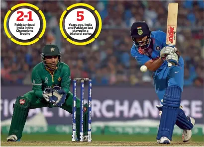  ?? AFP file ?? Pakistan lead India in the Champions Trophy Years ago, India and Pakistan last played in a bilateral series India’s Virat Kohli plays a shot as Pakistan’s Sarfaraz Ahmed looks on during the World T20 match at the Eden Gardens. —