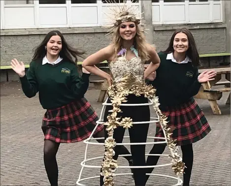  ??  ?? Katie Leppla, Aja Sinclair (model) and Emily Kavanagh are through to the grand final of Bank of Ireland Junk Kouture.