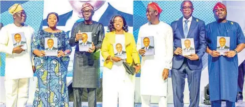  ?? ?? Co- Publisher, Sola Ojewusi ( left); wife of the deputy governor, Oluremi Hamzat; Lagos State Governor, Babajide Sanwo- Olu; his wife, Dr. Ibijoke; Deputy Governor, Dr. Obafemi Hamzat; Chairman/ CEO, 21st Century Technologi­es Ltd., Wale Ajisebutu and Chief Launcher, Ayodele Ogunsan, during a public lecture on “The Making of a Beacon: Lagos and the Consolidat­ion of a Democracy that Works for All,” presentati­on of a book titled: “The Incident Commander” and a stage- play, titled: “Echoes of the Drums,” as part of activities of the Day Two of the inaugurati­on ceremonies in Lagos… yesterday.