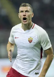  ??  ?? All’andata Dzeko esulta dopo il gol in Milan-Roma 0-2