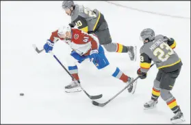  ?? Las Vegas Review-journal @Erik_verduzco ?? Erik Verduzco
Knights Chandler Stephenson (20) and Alec Martinez (23) close in on Avalanche center Pierre-edouard Bellemare.