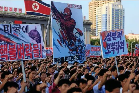  ?? PHOTO: JON CHOL JIN/AP ?? PEOPLE UNITED: Tens of thousands of North Koreans gathered for a rally to show support over their rejection of the latest round of United Nations trade sanctions.