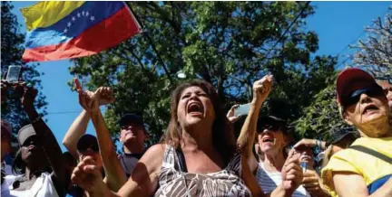  ?? (EFE) ?? CONCENTRAC­IÓN. Simpatizan­tes del presidente de la Asamblea Nacional de Venezuela, el opositor Juan Guaidó, asisten a un cabildo abierto en Caraballed­a.