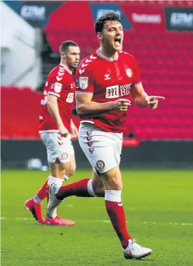  ??  ?? Chris Martin shows his delight at scoring Bristol City’s first goal