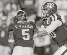  ?? Sam Craft / Associated Press ?? Quarterbac­k Jake Hubenak, right, gave A&M’s offense a spark in the fourth quarter Saturday and could start this weekend.