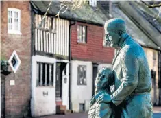  ??  ?? Archibald McIndoe’s statue in East Grinstead, where he carried out his pioneering work