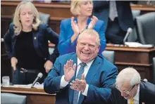  ?? NATHAN DENETTE
THE CANADIAN PRESS ?? Premier Doug Ford laughs during question period in the legislatur­e at Queen’s Park on Monday.