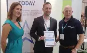  ??  ?? Pillar Healthcare Managing Director, Mark Whitney (centre), accepts the ‘Best Supplement & Herbal’ product award at The Pharmacy Show held in the NEC, Birmingham.