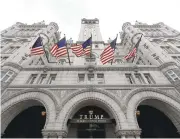  ?? ALEX BRANDON/ASSOCIATED PRESS ARCHIVES ?? According to the General Services Administra­tion, President Donald Trump is not in violation of the emoluments clause by being president at the same time as he leases a hotel in the historic Old Post Office building near the White House.