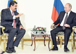  ?? AP ?? President of Venezuela Nicolás Maduro (left) speaks to Russian President Vladimir Putin during their meeting after the World Energy Congress in Istanbul yesterday.