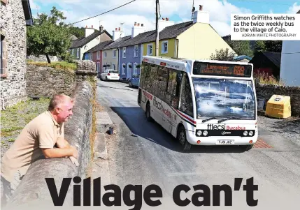  ?? ADRIAN WHITE PHOTOGRAPH­Y ?? Simon Griffiths watches as the twice weekly bus to the village of Caio.