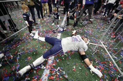  ?? GEtty imAgES filE ?? SOAKING IT IN: James Develin celebrates with his kids, James III and William Robert Develin, after the Patriots beat the Rams in Super Bowl LIII at Mercedes-Benz Stadium on Feb. 3, 2019 in Atlanta, Ga.