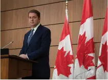  ?? ADRIAN WYLD THE CANADIAN PRESS ?? Tory Leader Andrew Scheer supports a hybrid Parliament, with some MPs physically present and others connected virtually.