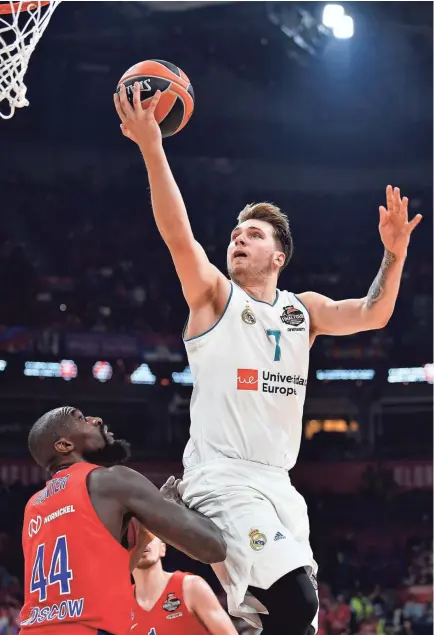  ??  ?? Luka Doncic goes to the basket during the Euroleague Final Four semifinals. He is considered one of the most accomplish­ed European prospects ever.ANDREJ ISAKOVIC/AFP/GETTY IMAGES