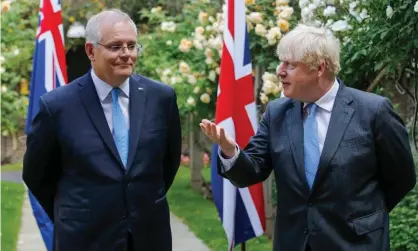  ?? Photograph: Luke Macgregor/EPA ?? The Australian prime minister, Scott Morrison, and the UK prime minister, Boris Johnson. Morrison’s government says beef and sheep meat tariffs on Australian exports to the UK will be eliminated after 10 years.