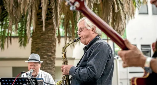  ?? BRADEN FASTIER/NELSON MAIL ?? Not Too Dry were among the acts who performed at the top of Trafalgar St during the Nelson Jazz Festival.