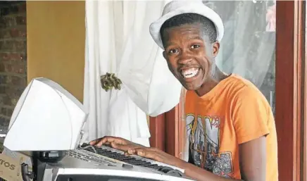  ?? Picture: MADELEINE CHPAUT ?? PURE JOY: Self-taught JR Nkosi will be playing the keyboard at an Autism Awareness concert on Sunday