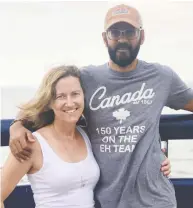  ?? HEATHER VAN SICKLE ?? Tracy hugs husband Neil Bantleman after the Canadian flew home following five years in an Indonesian prison.