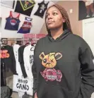  ?? STU BOYD II/THE COMMERCIAL APPEAL ?? Crysti’anna Whitehead, one of the most decorated basketball players in Memphis Business Academy history, has a clothing line called Hoop Gang. She has a variety of merchandis­e ranging from beanies and hoodies, to T-shirts and more.