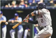  ?? Brian Davidson / Getty Images ?? Alex Bregman of the Astros hits a three-run homer against the Royals. He had four RBIs in the win.