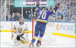  ?? Jeff Roberson The Associated Press ?? Oskar Sundqvist (70) gets one of the Blues’ three goals in the second period of a 4-2 victory over the Golden Knights. Sundqvist also set up a first-period goal.