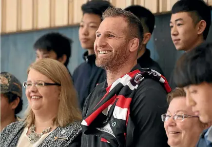  ?? PHOTO: GETTY IMAGES ?? All Blacks captain Kieran Read appeared to be happy making his NZ Rugby re-signing announceme­nt back at his old school, Rosehill College.