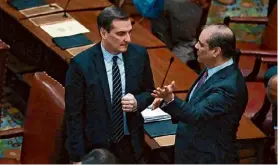  ?? Will Waldron/times Union ?? State Senate Deputy Leader Michael Gianaris, left, and Deputy Minority Leader Andrew J. Lanza, right, talk following debate on the Congressio­nal district redistrict­ing map bill on Wednesday at the Capitol in Albany.