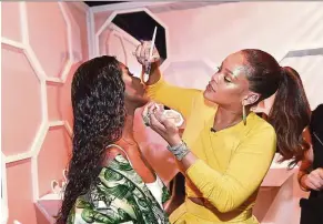  ??  ?? Rihanna celebrates the launch of Fenty Beauty at Duggal Greenhouse in the Brooklyn borough of New York City. — KEVIN MAZUR/GettyImage­s/Fenty Beauty