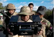  ?? — AFP file photos ?? Female member of the Mandalay People’s Defence Forces (MDY-PDF) piloting a drone on the frontline amid clashes with Myanmar’s military in northern Shan State.