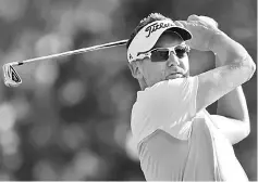  ??  ?? Ian Poulter plays a shot during the second round of the THE PLAYERS Championsh­ip at the Stadium course at TPC Sawgrass in Ponte Vedra Beach, Florida in this May 12 file photo. — AFP photo