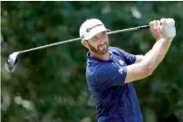  ?? AP ?? Johnson finished the tournament with a four-round aggregate 261, 19 under par at TPC Southwind in Memphis. —