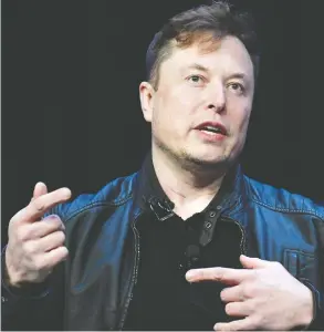  ?? SUSAN WALSH / THE ASSOCIATED PRESS FILES ?? Tesla chief executive Elon Musk has come out swinging in a bid to reopen the company’s auto plant in California that was closed due to the coronaviru­s pandemic.