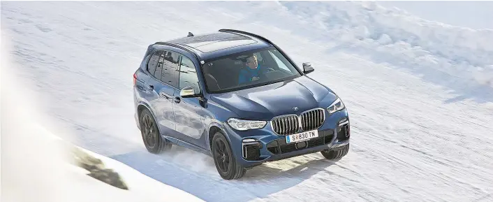  ??  ?? Der BMW X5 ist in der vierten Generation deutlich gewachsen und voller innovative­r Assistente­n. Beeindruck­end ist die Fahrdynami­k des Riesen.