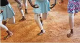  ??  ?? Young ballerinas practice under the instructio­n of Kenyan ballet dancer Joel Kioko, 16, in a room at a school in the Kibera slum of Nairobi, Kenya.