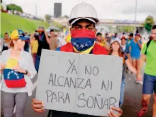  ?? /GETTY IMAGES. ?? Los opositores al Gobierno del presidente venezolano tienen un mes y medio en protestas callejeras.