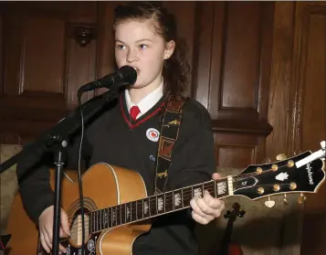  ??  ?? Éire Ní Fhaoláin was among the musical performers at the Mhean Scoil Garman open evening.