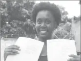  ??  ?? Juzzle Sayles proudly displays her examinatio­n certificat­es while speaking to the Jamaica Observer on Wednesday.