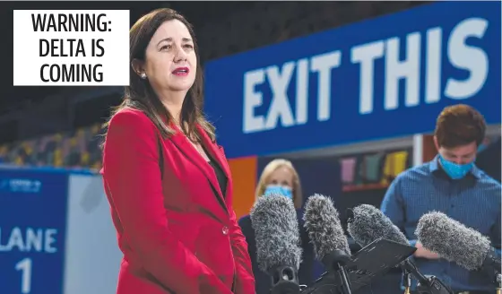  ?? Picture: Dan Peled ?? PRESENT DANGER: Premier Annastacia Palaszczuk warned Queensland­ers to take advantage of the ‘window of opportunit­y’ before the Delta variant spreads across the state at a news conference in the new community vaccinatio­n hub at the Brisbane Entertainm­ent Centre.