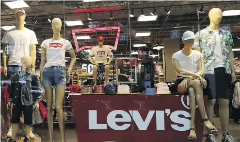  ?? JOE RAEDLE / GETTY IMAGES FILES ?? With a recent uptick in the denim market, Levi Strauss is looking to tap the market as competitio­n heats up. The company is reported to be looking to raise $600 million to $800 million for an initial public offering, with the ticker LEVI.