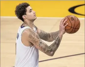 ?? Kyusung Gong Associated Press ?? KYLE KUZMA seems poised for bigger responsibi­lity this season, but Lakers coach Frank Vogel said it’s “to be determined” if Kuzma will start or be a reserve.