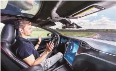  ?? PHOTO: BLOOMBERG ?? A Tesla Model S car fitted with self-driving technology