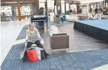  ?? RJ Sangosti, The Denver Post ?? Barbara Stoner of Westminste­r started shopping at 5 p.m. on Thanksgivi­ng and continued to shop on Black Friday at Cherry Creek Shopping Center. The mall opened its doors at 6 a.m.