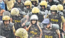  ?? PTI ?? Journalist Kavitha Jakkal being escorted by the police to Sabarimala Temple on Friday.