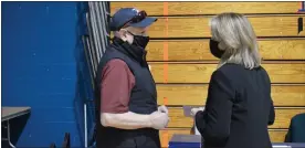  ?? RACHEL RAVINA - MEDIANEWS GROUP ?? Vietnam-era Veteran Philip Bagley, 73, of Elkins Park, converses with U.S. Rep. Madeleine Dean, D-4th Dist., Sunday morning during a COVID-19vaccinat­ion clinic organized by Skippack Pharmacy at North Penn High School in Lansdale.