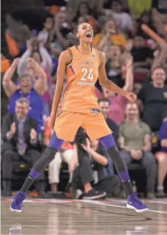  ?? ROB SCHUMACHER/ THE REPUBLIC ?? The Mercury’s DeWanna Bonner reacts after makinga long shot against the Dallas Wings in the second half during a first-round WNBA playoff game at Wells Fargo Arena on Tuesday.